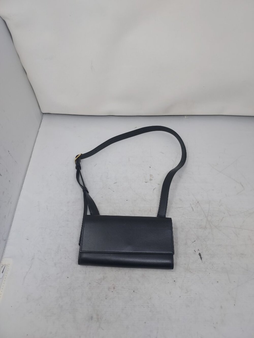 The Row Black Buckle Strap Cross Body Bag